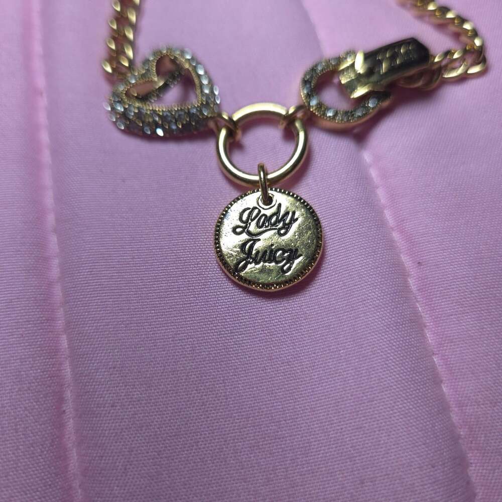 Juicy Couture Gold Plated Heart Charm Necklace with Lady Juicy and Love Luck